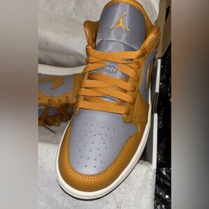 Yellow and Grey Jordan 1s Low